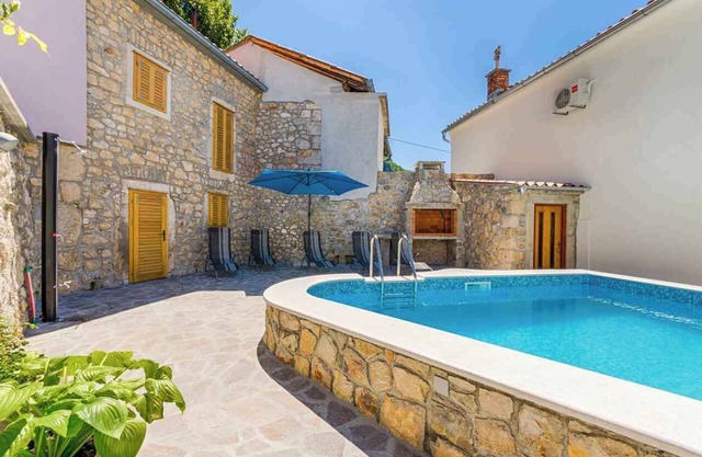Holiday home with pool, sun terrace and barbecue