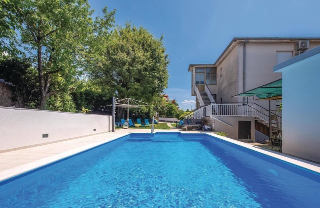 This attractive apartment is located in Kostrena, right by the sea and also not far from Crikvenica.