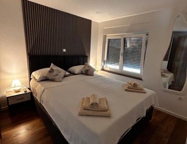 Deluxe One-Bedroom Apartment with Garden View