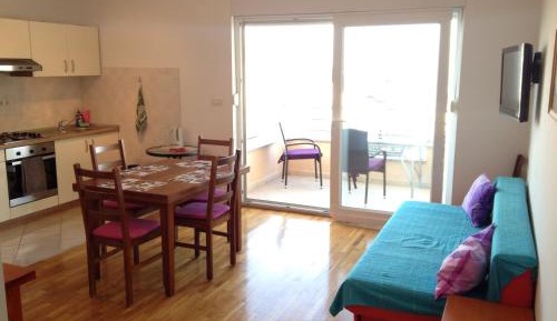One-Bedroom Apartment with Balcony and Sea View