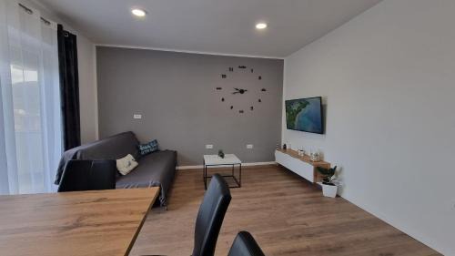Three-Bedroom Apartment with Terrace and Sea View