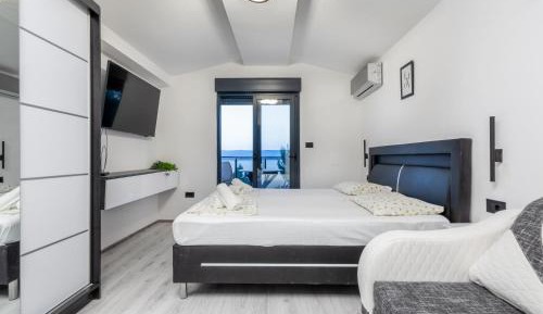 One-Bedroom Apartment with Balcony and Sea View