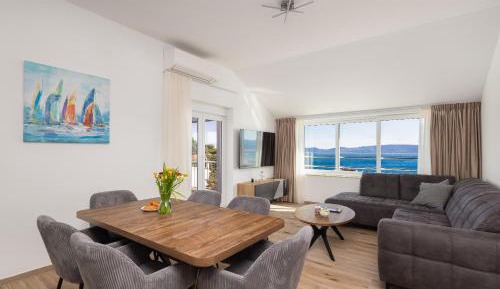 Three-Bedroom Apartment with Sea View