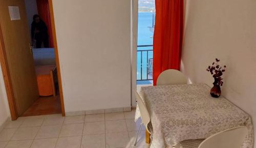 One-Bedroom Apartment with Balcony and Sea View