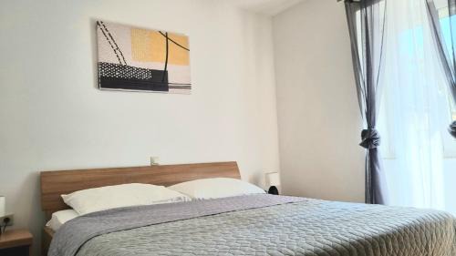 Two-Bedroom Apartment with Balcony and Sea View