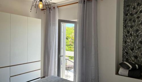One-Bedroom Apartment with Balcony and Sea View