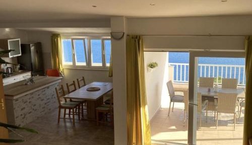 Three-Bedroom Apartment with Terrace and Sea View
