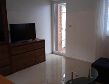 One-Bedroom Apartment with Balcony and Sea View