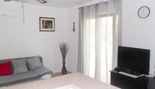 Three-Bedroom Apartment with Terrace and Sea View