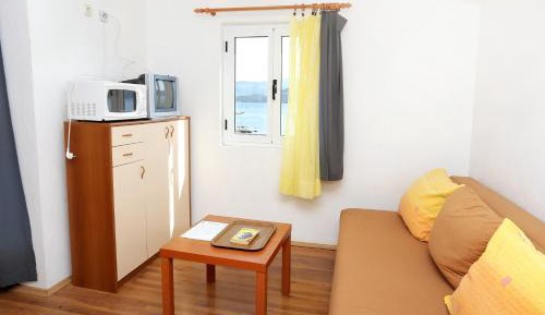 One-Bedroom Apartment with Balcony and Sea View