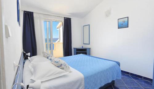 One-Bedroom Apartment with Balcony and Sea View