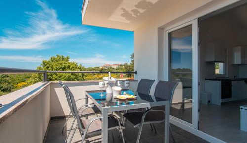 Two-Bedroom Apartment with Balcony and Sea View