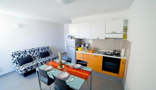 One-Bedroom Apartment with Balcony and Sea View